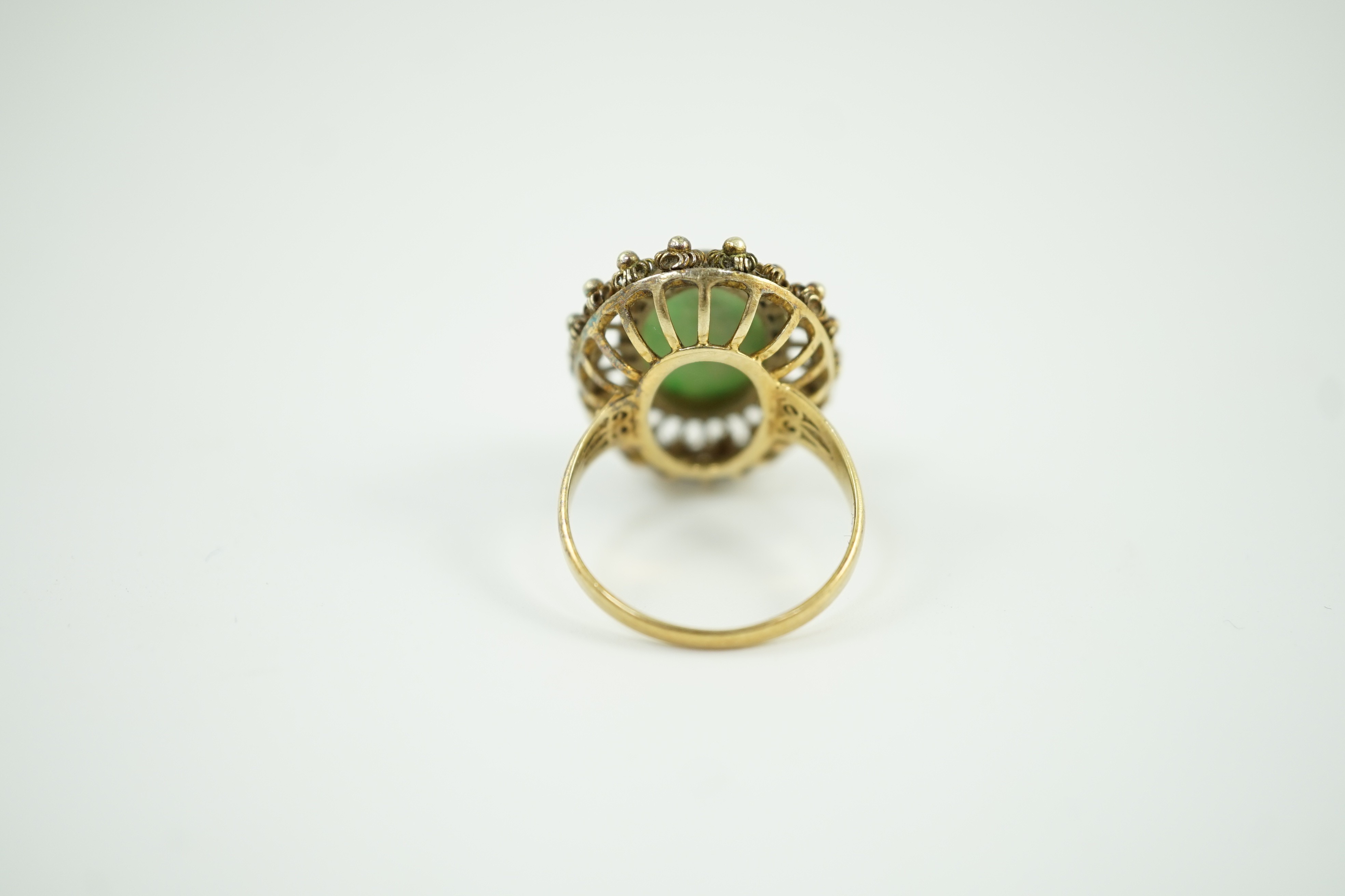 A Chinese? 14k yellow metal and cabochon jadeite set dress ring, size N, gross weight 6.3 grams.